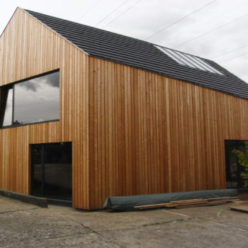maison individuelle ossature charpente bois, matériaux naturels et recyclés, bardage bois mélèze, bâtiment basse consomamtion